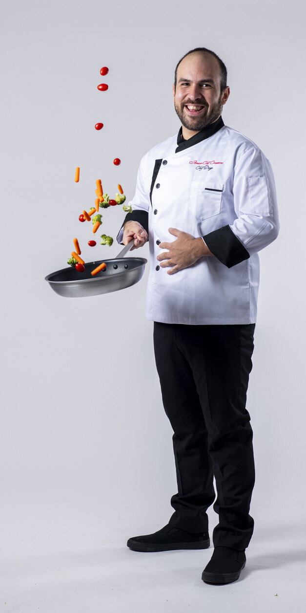 An Amazen chef presenting a sauté pan
